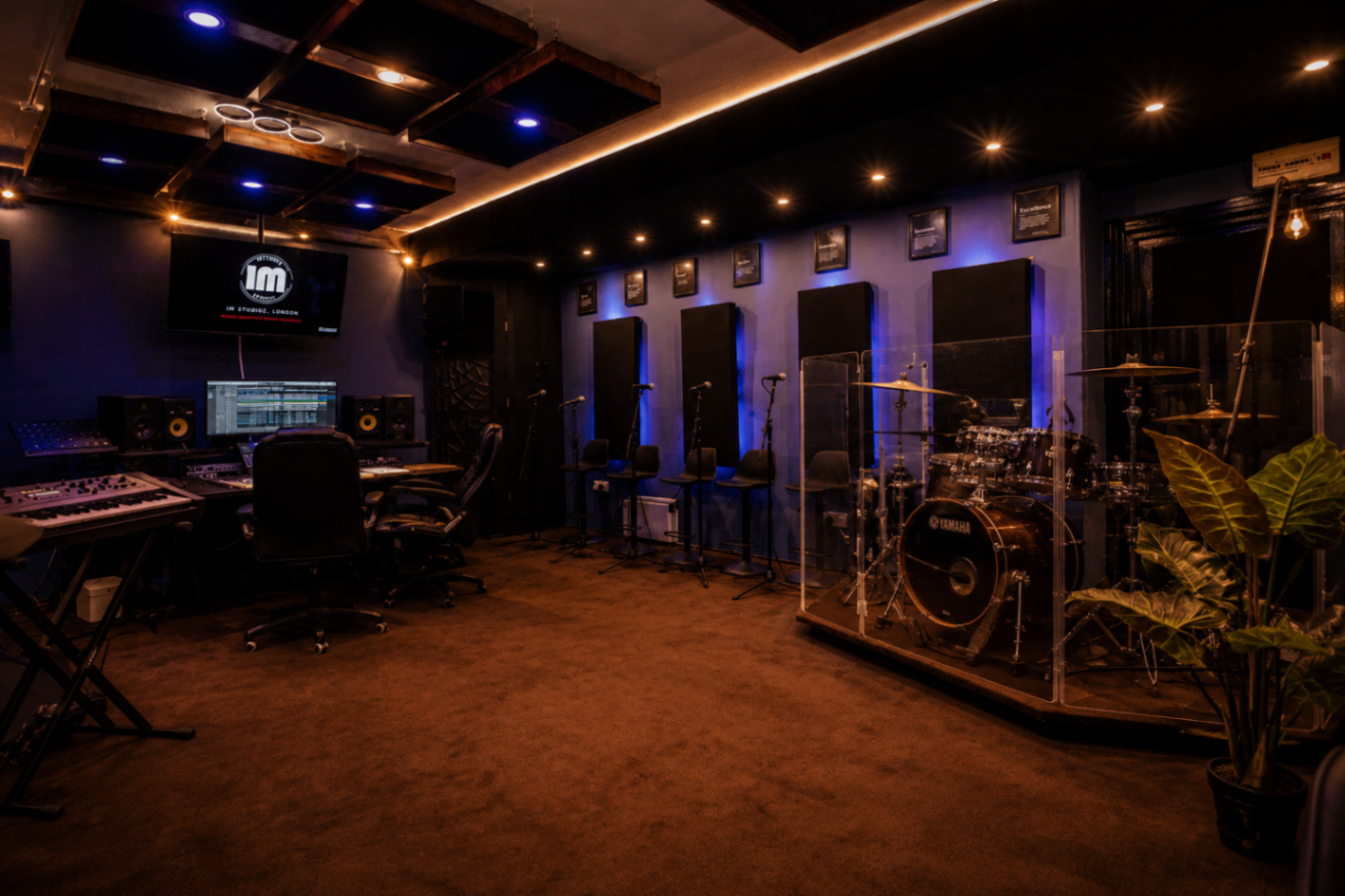 Wide studio floor view showing production area and drum booth
